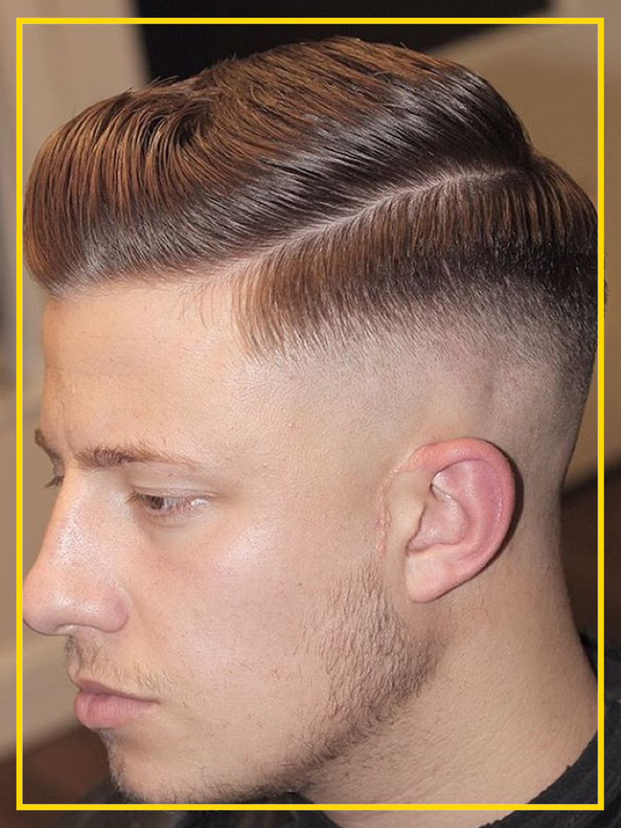 Mid Fade com penteado clássico masculino.